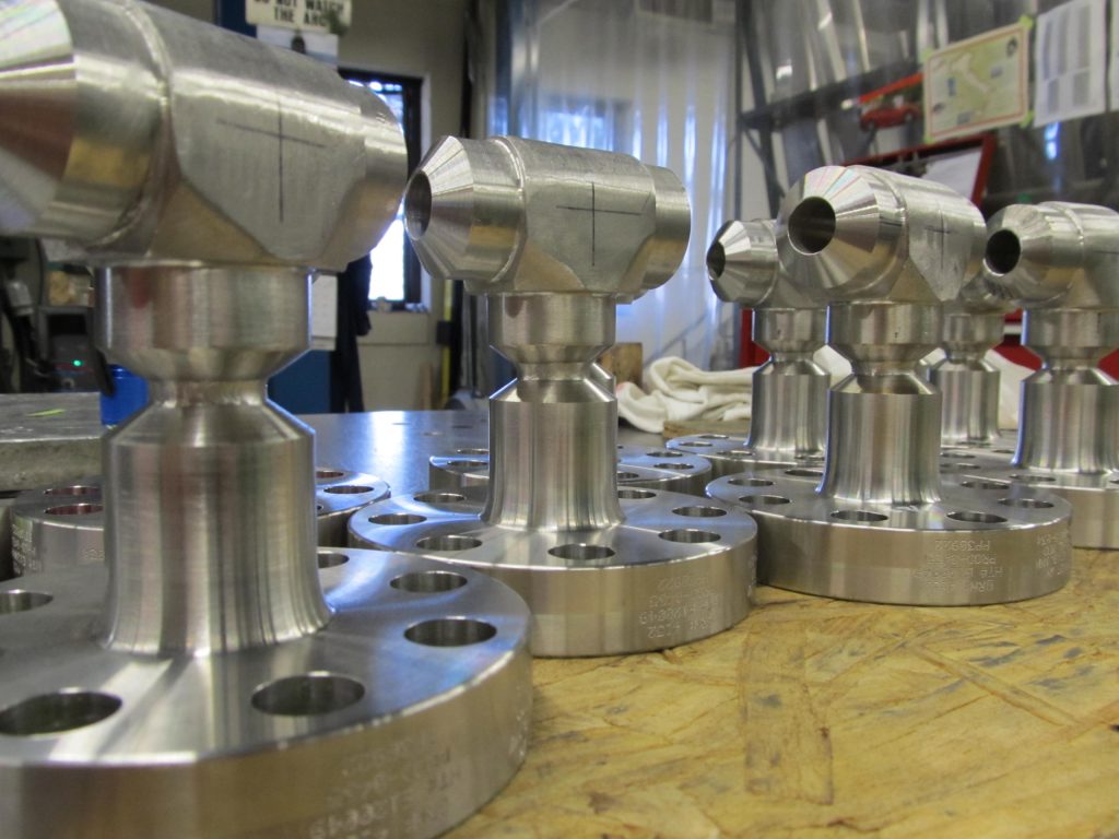 Flanges with contour pattern tees